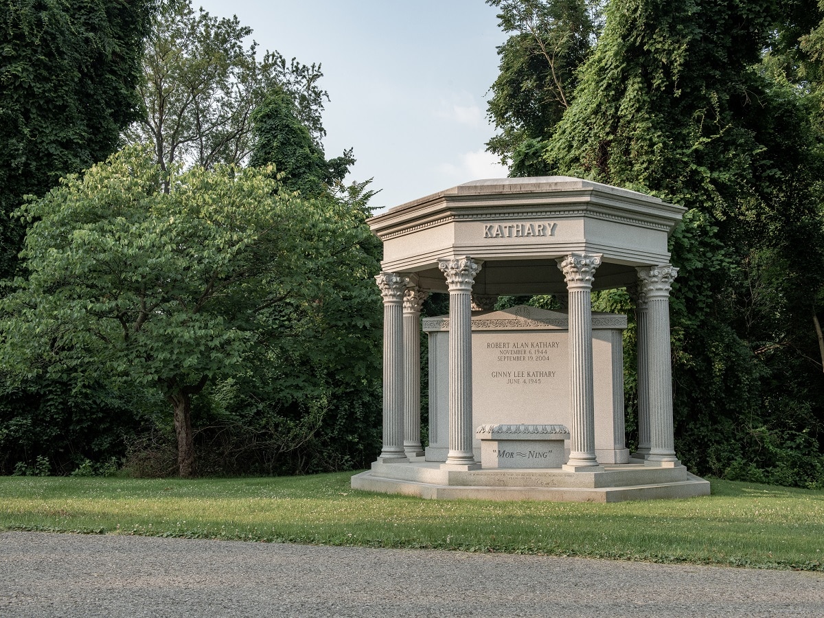 Large, custom garden multi-crypt mausoleum with family name