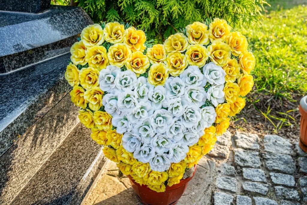 Leaving flowers on a loved one's headstone is a common decoration.