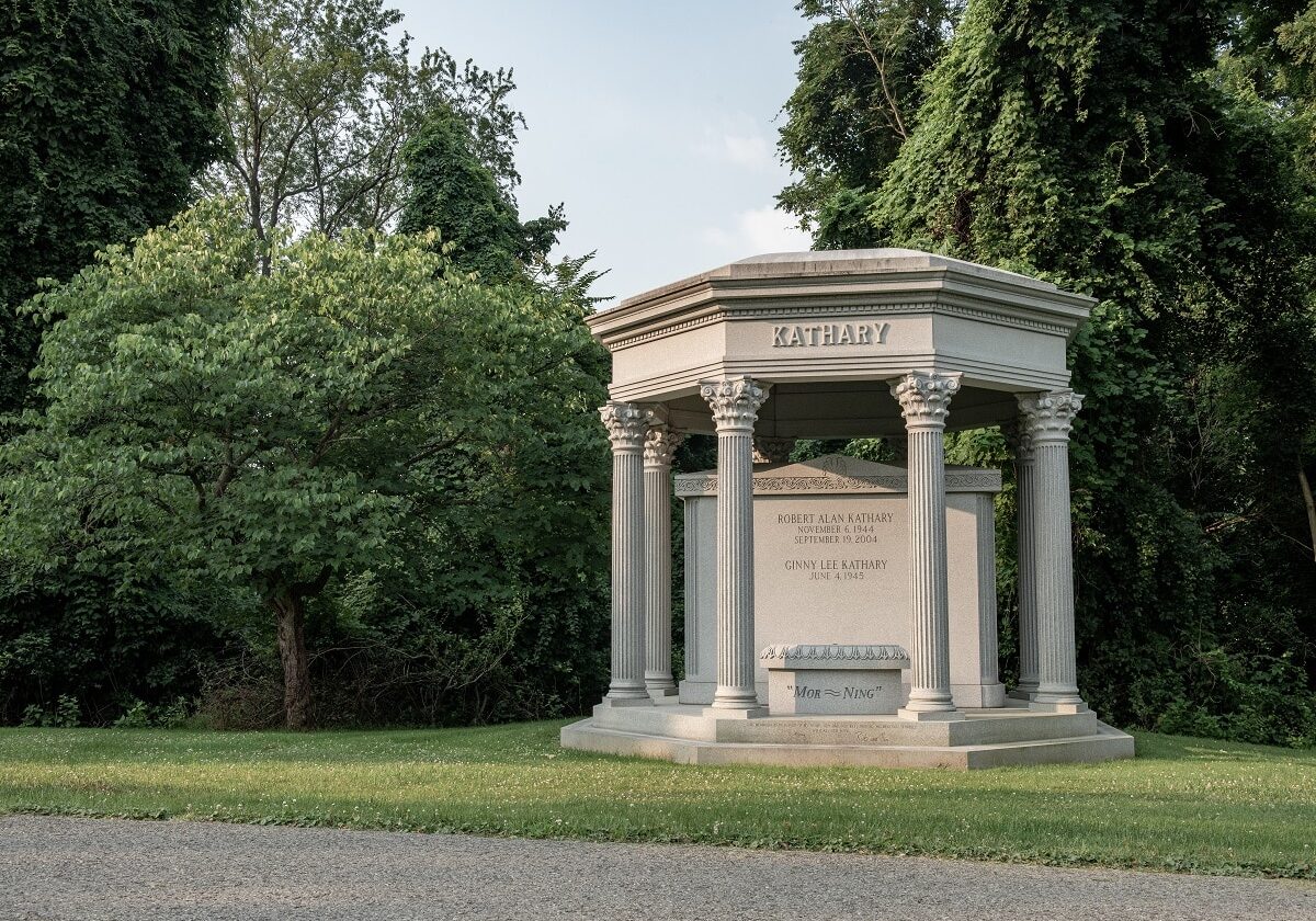 Large, custom garden multi-crypt mausoleum with family name