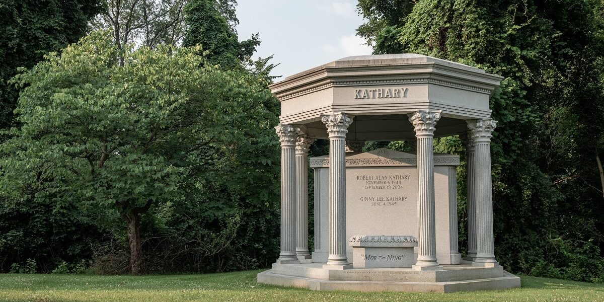 Large, custom garden multi-crypt mausoleum with family name