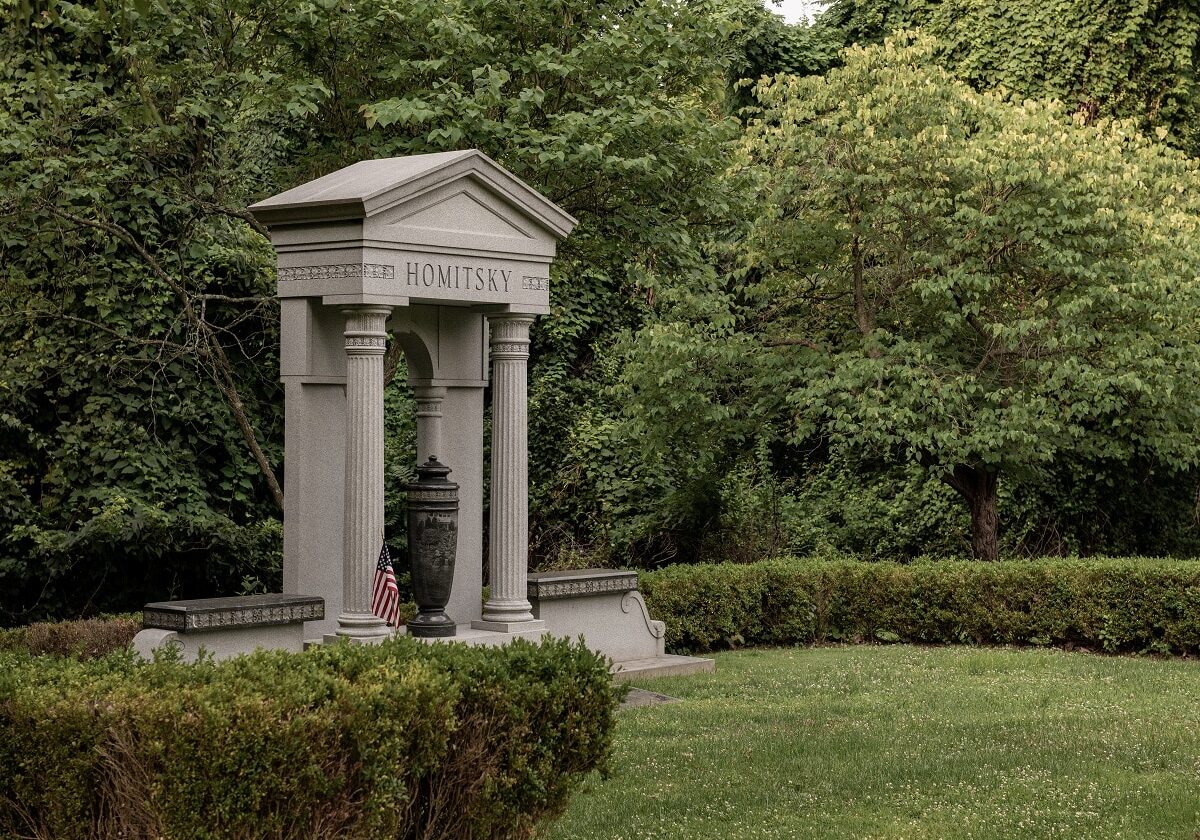 Upright monument memorial with family name