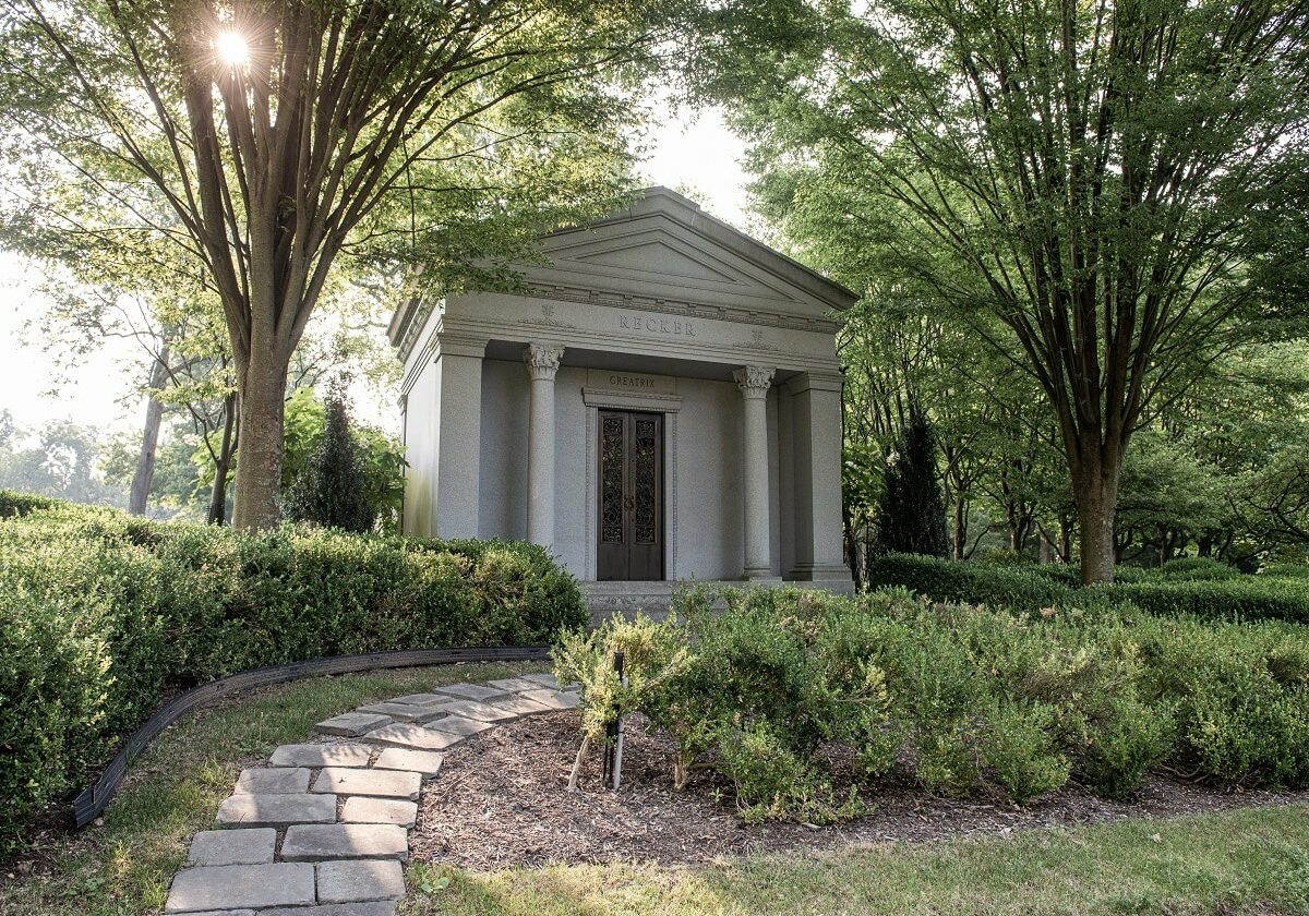 Dio + Co. custom luxury mausoleum surrounded by trees (private family mausoleum)