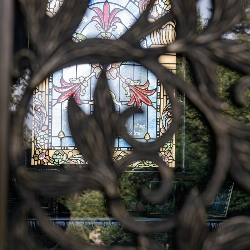 Walk-in mausoleum doors with stained glass windows