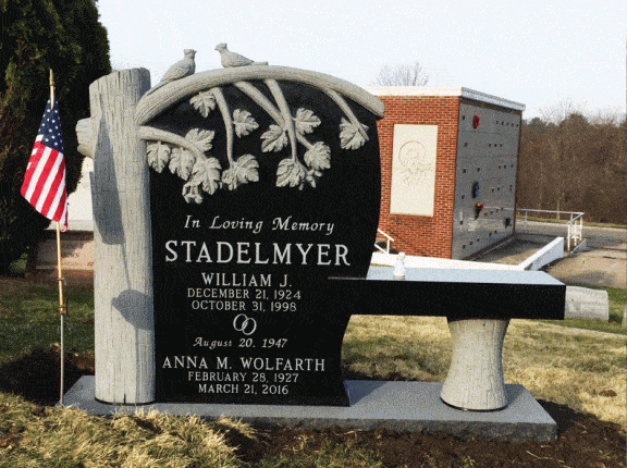 A memorial bench can create a more calming memorial space and provide seating for a memorial service